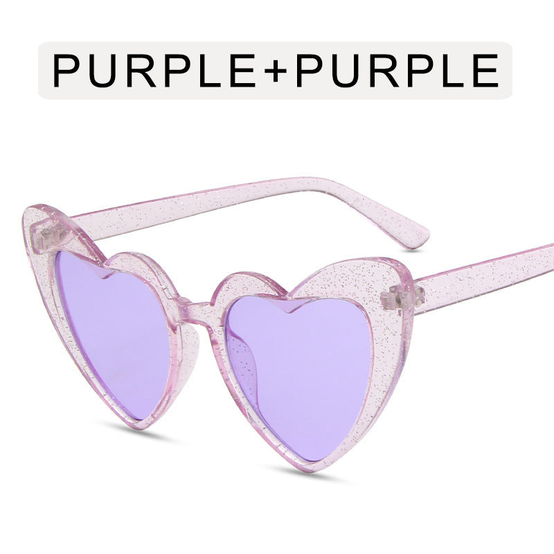 Heart shaped sunglasses with glitter frame