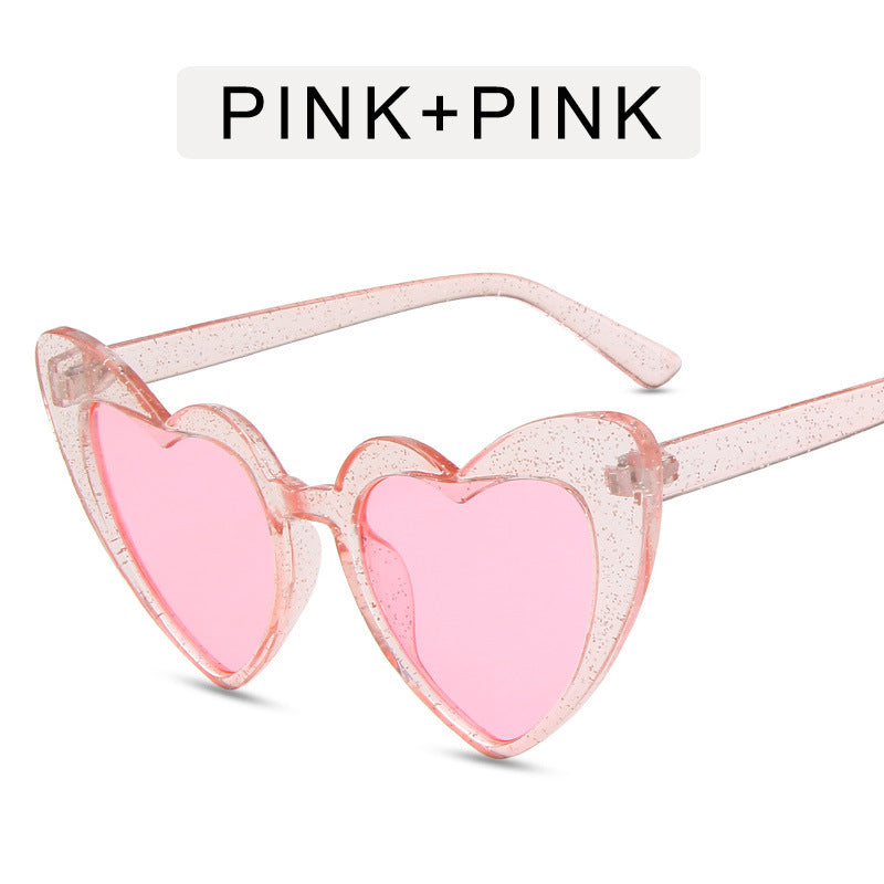 Heart shaped sunglasses with glitter frame