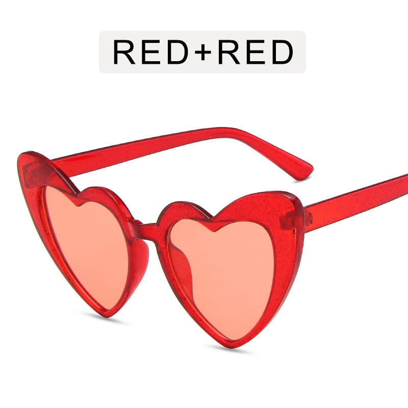 Heart shaped sunglasses with glitter frame