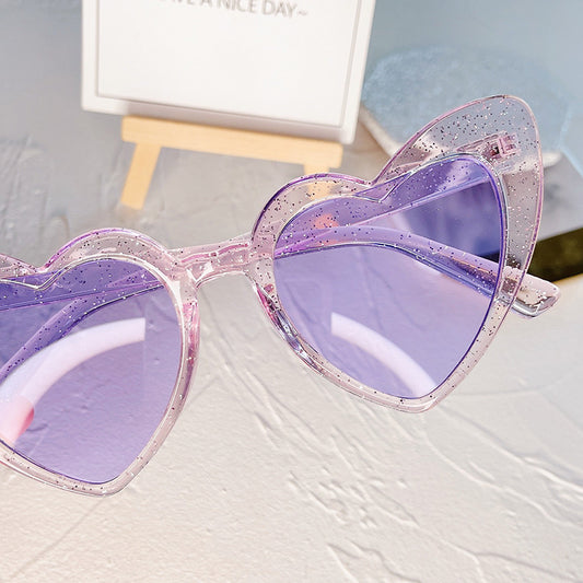 Heart shaped sunglasses with glitter frame